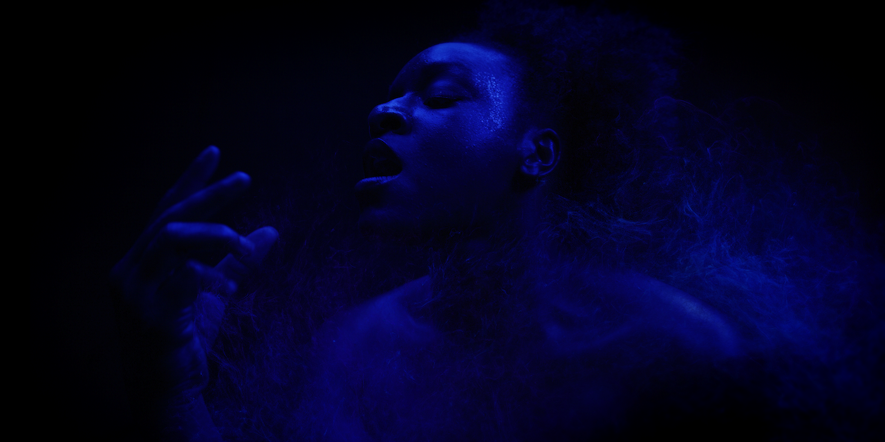 Still featuring Hvrmony Adams performing Adowa movement choreographed by Elisabeth Efua Sutherland.